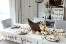 09 a rustic Thanksgiving table setting with neutral pumpkins, wheat and a cornucopia centerpiece