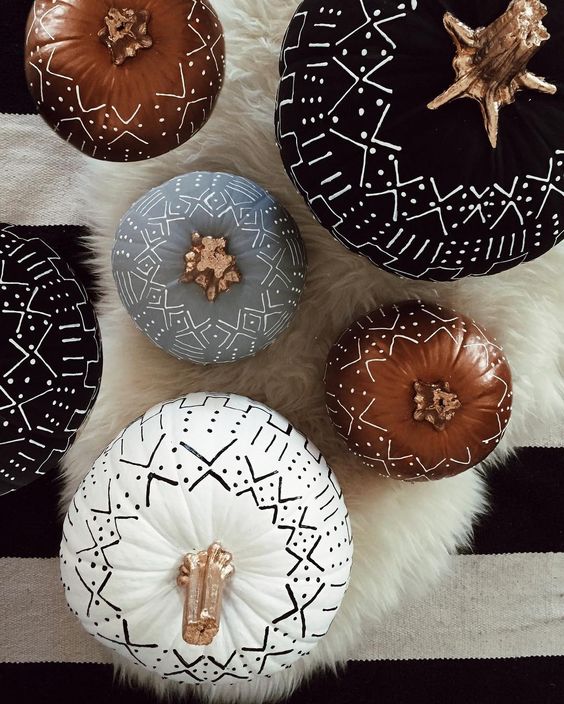 tribal pumpkins in black, white and rust decorated with a usual sharpie is a simple boho craft