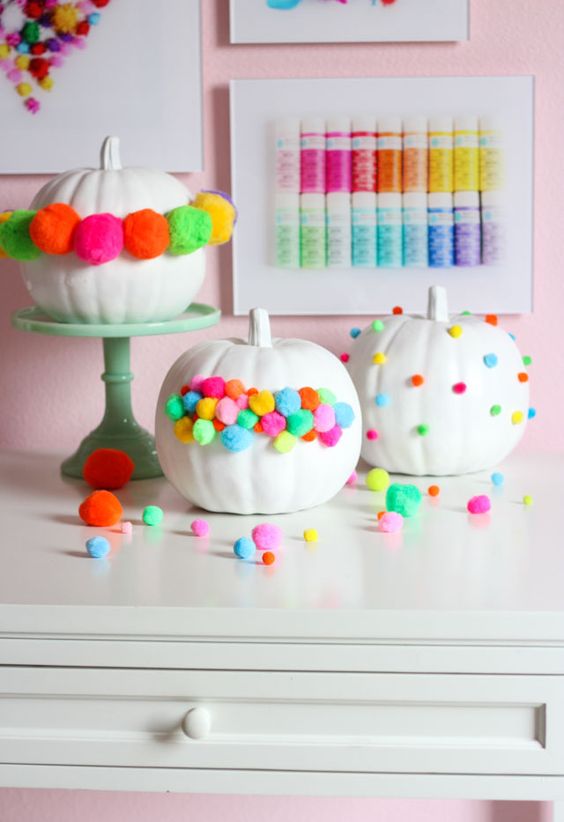 colorful pompom pumpkins are great for Halloween, fall and Thanksgiving parties in bold shades