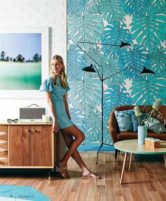 a bright monstera leaf statement wall is amazing for sprucing up the space and making it bold