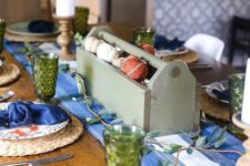 11 a simple and rustic Thanksgiving setting with a bold blu runner and napkins plus green glasses
