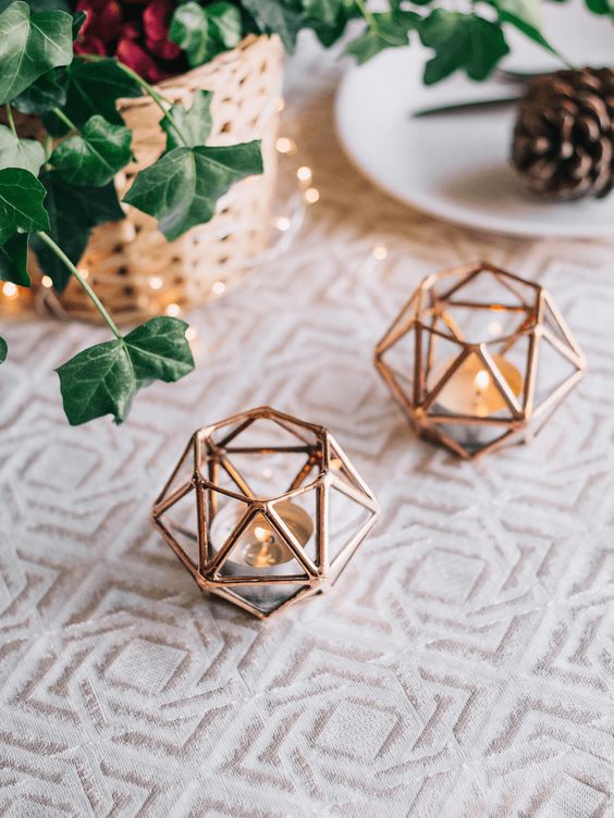 such geometric copper candle holders are a nice idea for any season and holiday, they never go out of style