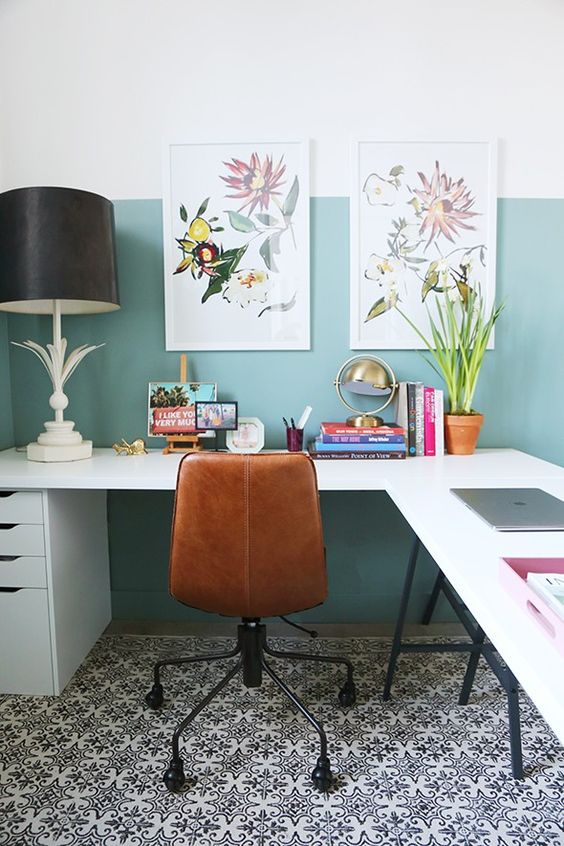 a light green color blocked wall makes the space cooler and bolder adding a modern feel to it