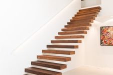 13 the secret of seamless staircases is attaching them to walls or railings to make them look ethereal