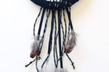 15 a black dream catcher with feathers is a simple and very cool boho chic Halloween craft