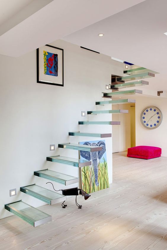 glass floating staircases look even more ethereal and airy than of any other material