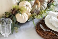17 a natural fall centerpiece of a tray, seeded eucalyptus, heirloom pumpkins and pinecones for a rustic feel