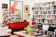 17 lots of books placed on the walls are great for maximalist spaces
