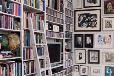 19 a large bookshelf unit that takes the whole wall is a great idea for a maximalist space, and artworks on the other wall help to show off the trend too