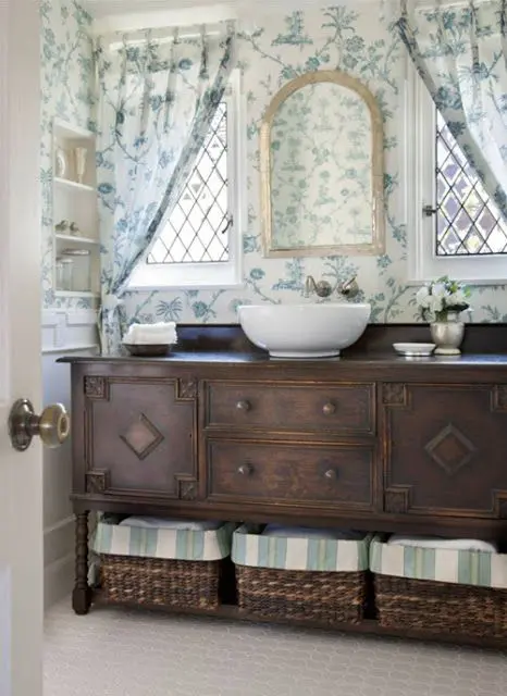 florals amd stripes beautifully mixed in bathroom decor and dark stained furniture for a contrast