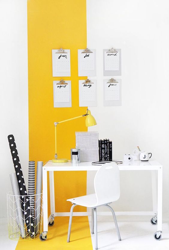 make your home office welcoming and mood-raising with a color block effect in yellow and white