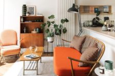20 warm orange and coral are mixed with fresh greenery and calmed down with natural wood