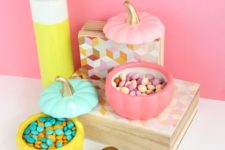 21 make some color block faux pumpkin candy dishes for your cool Halloween candy bar