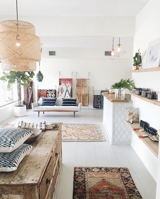 an open layout in Scandinavian style with various Nordic motifs and different boho chic prints