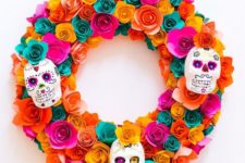 25 a super colorful paper flower wreath with painted sugar skulls is a chic idea that can be DIYed
