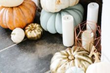 25 fill the non-working fireplace with heirloom pumpkins and place some candles in cool lanterns