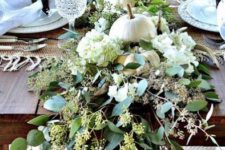 26 white real pumpkins, hydrangeas and fresh eucalyptus are all you need for a gorgeous Thanksgiving table decoration