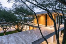 01 This contemporary house in Ecuador features three wings and trees growing through the house
