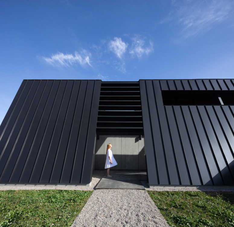 Minimalist Fortress-Like Home With A Black Exterior