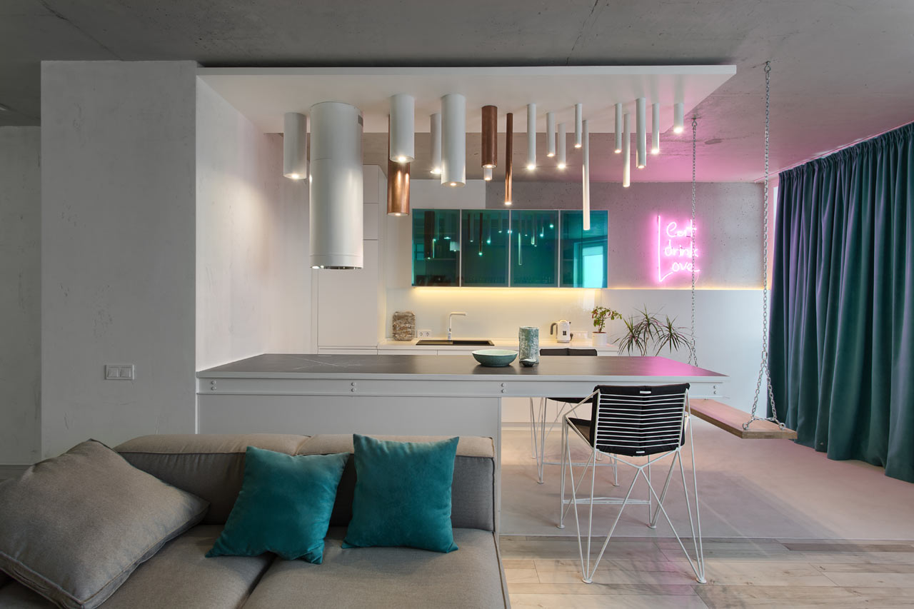 This minimalist apartment is spruced up with pink and green neon touches
