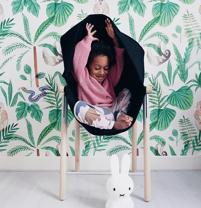 Mia’s seat hugs kids and offers mild deep pressure soothing which boosts serotonin levels and helps with stress