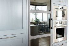 02 choose a fridge with a look that fits your kitchen design or just change the door to make it a perfect fit