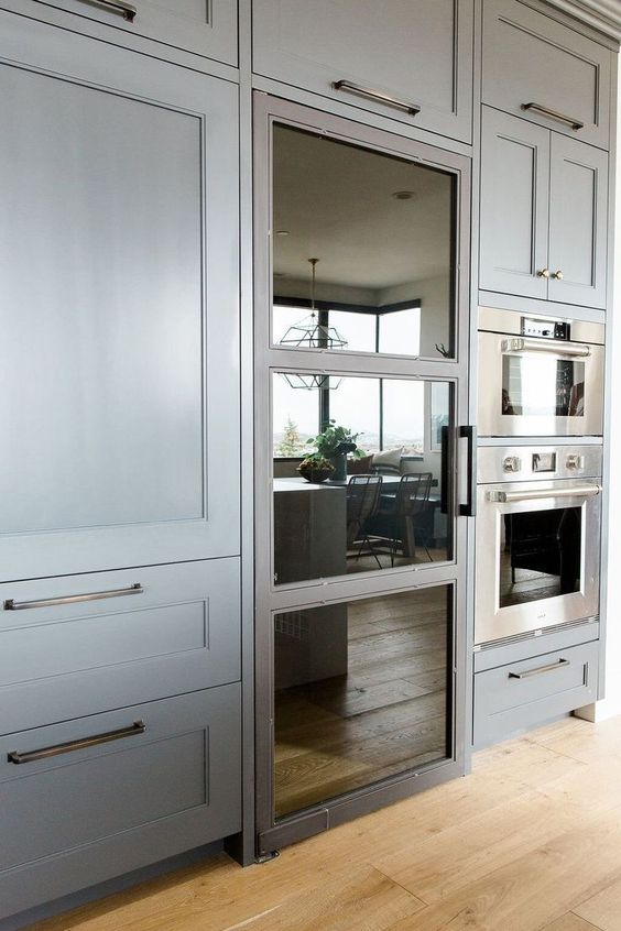 choose a fridge with a look that fits your kitchen design or just change the door to make it a perfect fit