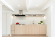 neutral kitchen design with a neutral backsplash