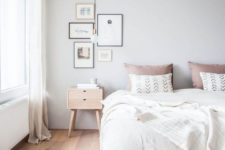 03 a welcoming and airy Scandinavian bedroom with all-natural linens and a touch of dusty pink