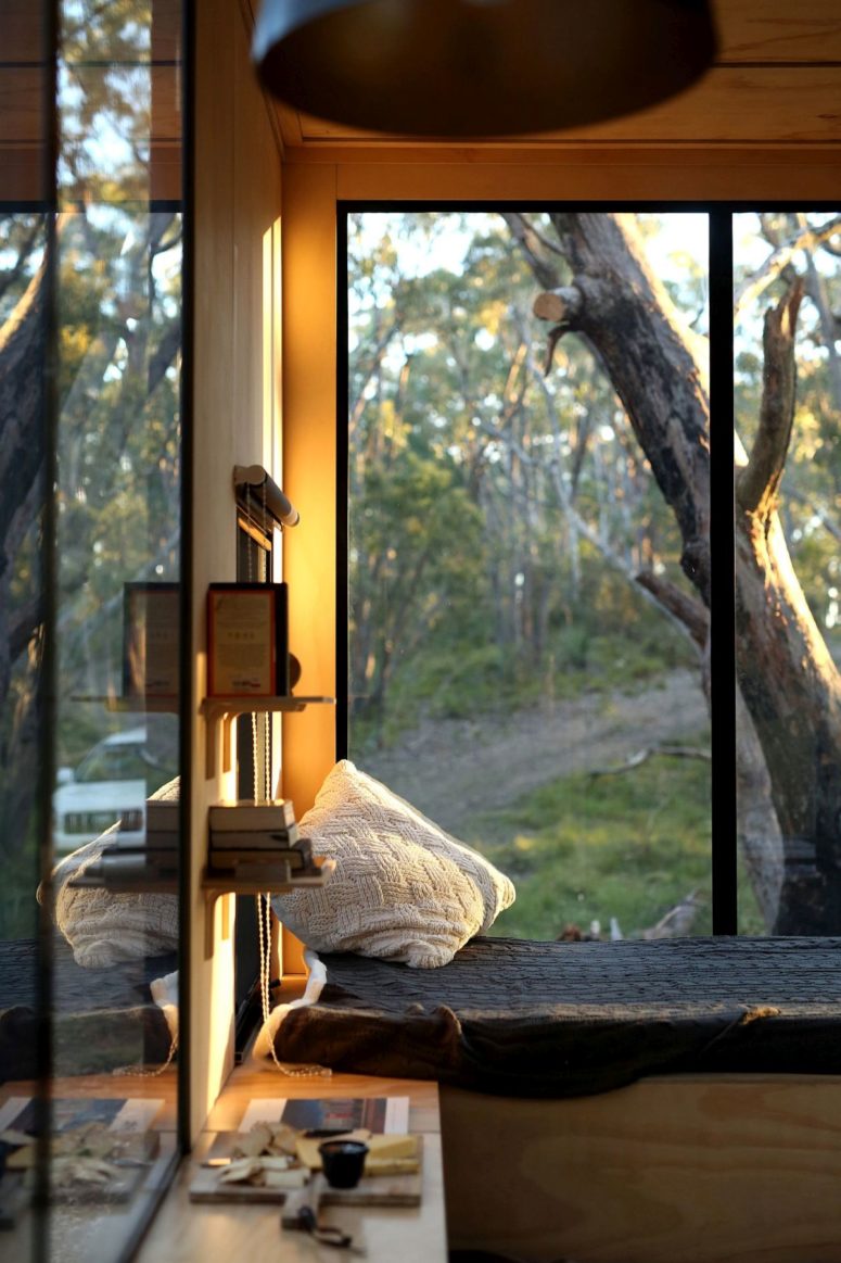 The sleeping space byt the window allows enjoying the views anytime, there are shelves around