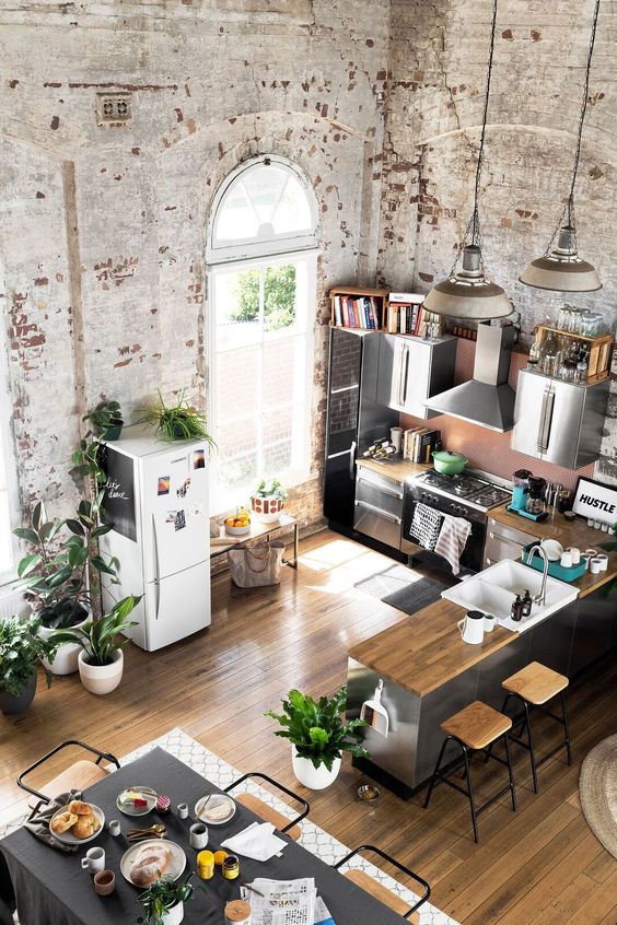 open layouts are very popular for industrial style homes, they help fill the space with light