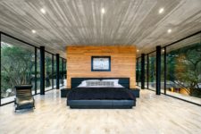 05 The master bedroom is glazed from all sides to make the owners feel like outdoors