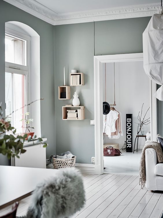 a Scandinavian space spruced up with pale green looks unusual and very catchy