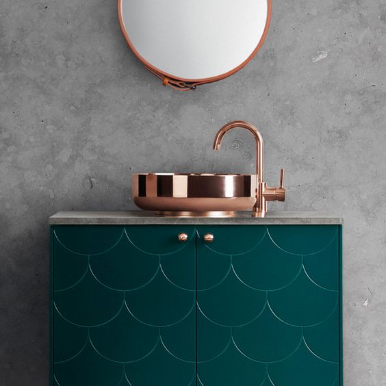 copper is a great idea to soften the space and make it more feminine, even if you have concrete or stone around