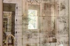 06 a vintage mirror wall will make your bathroom refined, chic and vintage-like at once and will bring old Hollywood glam