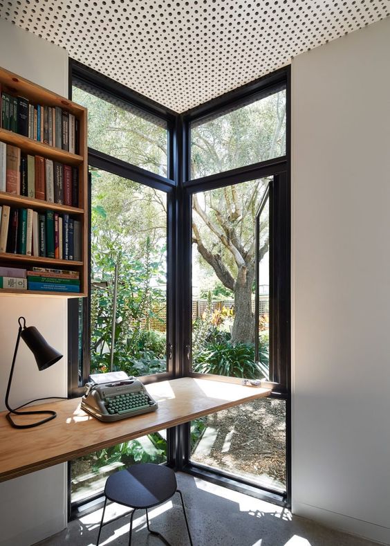 a double corner window brings even more light while keeping your home office more private