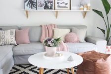 08 Scandinavian interiors have been dotted with color lately, like here with pink pillows and throws