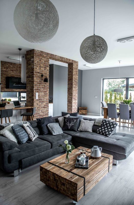 greys, browns and touches of off-white are great for an industrial home, it's deep and dramatic