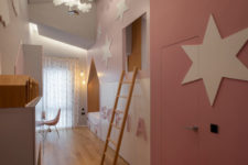 10 The kid’s room is done in pink and white, though it’s rather long and narrow, there’s everything necessary