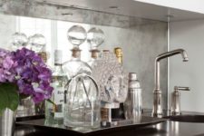 14 an antique mirror backsplash will reflect light and make your home bar stunning and catchy