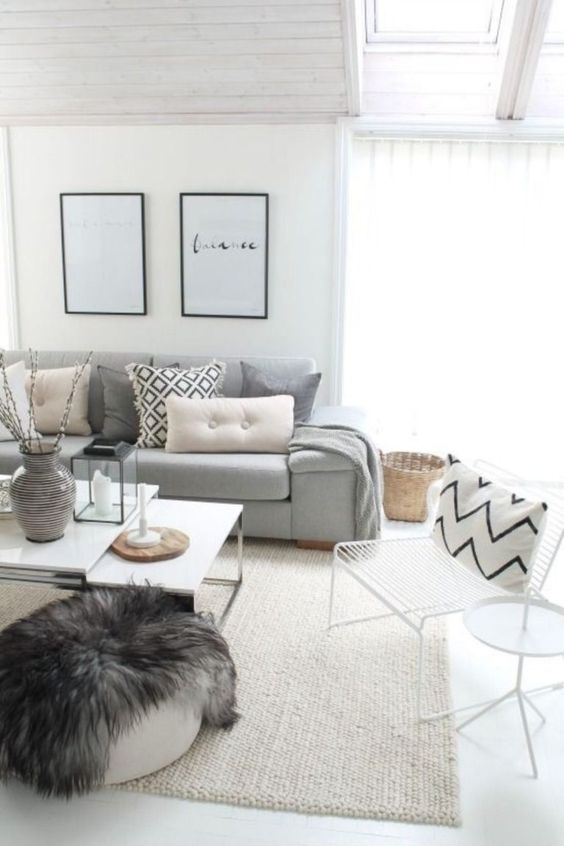 printed pillows make the space catchier, a faux fur throw and a comfy rug add coziness