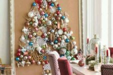 15 a large Christmas tree on canvas with a vintage frame is shaped only of colorful vintage ornaments for a chic look