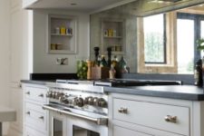 15 mirror backsplashes are making a huge comeback, they will easily fit any cabinet color and style