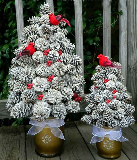 snowy pinecone Christmas trees in cool snowflake pots, fake red berries and birds are amazing for porch decor