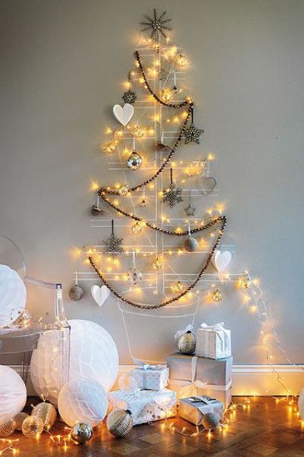 attach some wire or yarn right to the wall, add ornaments to shape a tree and add lights