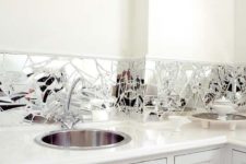 18 a broken mirror backsplash is a catchy feature that looks whimsy and can be easily DIYed by you