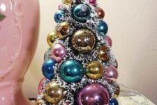 18 a chic pastel Christmas tree of ornaments with faux fur in between is a cool idea for a shabby chic interior