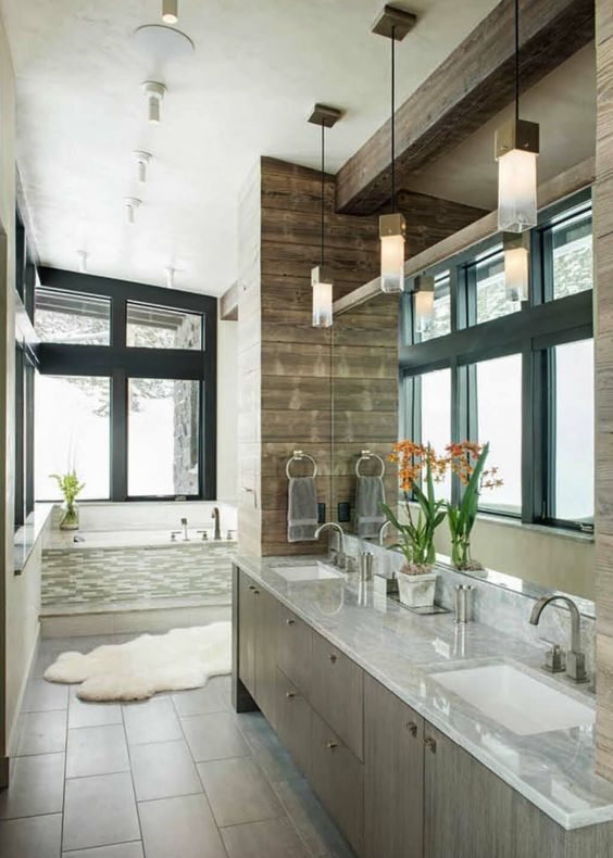even bathrooms in a modern rustic home should feature large windows to fill it with light
