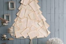 21 a Christmas tree of vintge book pages is idela for a book lover dwelling