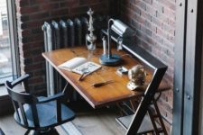 22 an industrial desk of wood and metal looks rather masculine and vintage